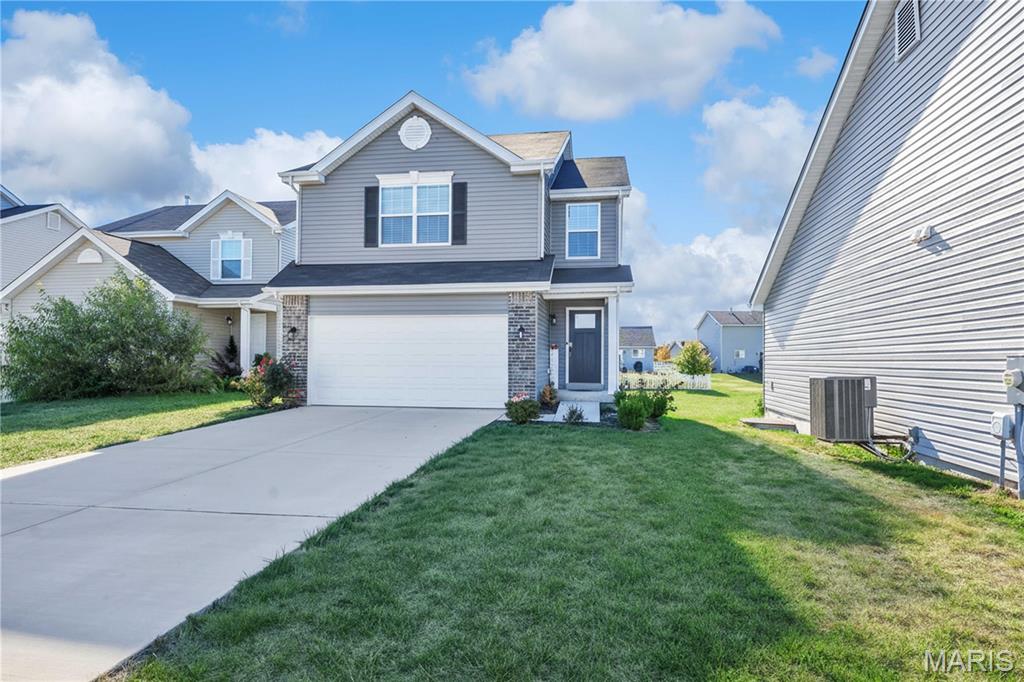 Welcome to your dream home in the highly sought-after Charlestowne Meadows community! This stunning 3-bedroom, 2.5-bathroom two-story home was built in 2023 and offers 1,719 sq ft of modern living space, perfectly situated on a quiet cul-de-sac. Step inside to an open floor plan featuring a spacious family room that seamlessly flows into the dining area and a gorgeous kitchen. The kitchen is a true showstopper with a flush breakfast bar, 42” premium dark cabinetry, stainless steel GE appliances, and beautiful wood laminate flooring that runs throughout the entire main level.

Upstairs, the luxurious primary suite includes two massive walk-in closets, a private en suite bath with a double bowl vanity, linen closet, and a large walk-in shower—your own private retreat! The second floor also boasts a convenient laundry room, two additional generously-sized bedrooms—each with walk-in closets—and a full bathroom, providing plenty of space for everyone.

Enjoy the benefits of upgraded lighting, ceiling fan prewires, and a spacious 2-car garage. This home is part of the Orchard Farm School District and located just a short walk from New Town, where you’ll find dining, shopping, and entertainment right at your fingertips. Best of all, the HOA covers lawn mowing and snow removal, making maintenance a breeze. Don't miss your chance to own this nearly new, move-in ready home in a fantastic location!