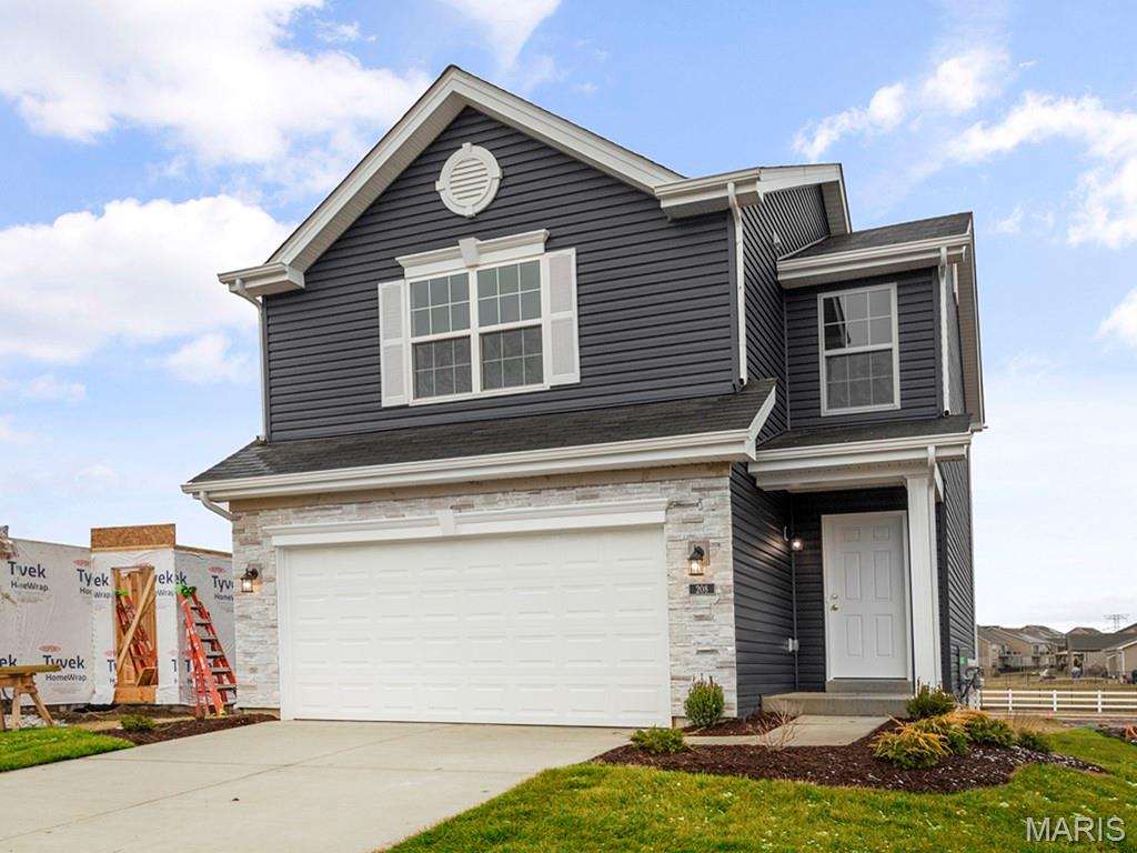 New McBride Homes 2 story Arlington 3BR, 2.5BA will be ready this spring! Enjoy 6’ windows & wood laminate flooring throughout main living area. The kitchen features level 4 Brellin White 42” tall cabinets, quartz countertops, & stainless-steel GE appliances. The breakfast area opens to the backyard, and the living room features a large window & ceiling fan. The primary suite features 2 walk-in closets & private bath w/5’ walk-in shower. Two more bedrooms w/walk-in closets, full bath, & 2nd floor laundry add convenience. Extras include white 6 panel doors, ceiling fan prewires, main floor powder room, 2-car garage w/coach lights, & more! Nestled in Truesdale right outside Warrenton, Elkhorn Ridge is in one of the most highly sought-after areas in Warren County. The neighborhood is also just minutes away from shopping, restaurants, grocery stores, and more. Enjoy peace of mind with McBride Homes’ 10 year builders warranty and incredible customer service! Similar photos shown.
