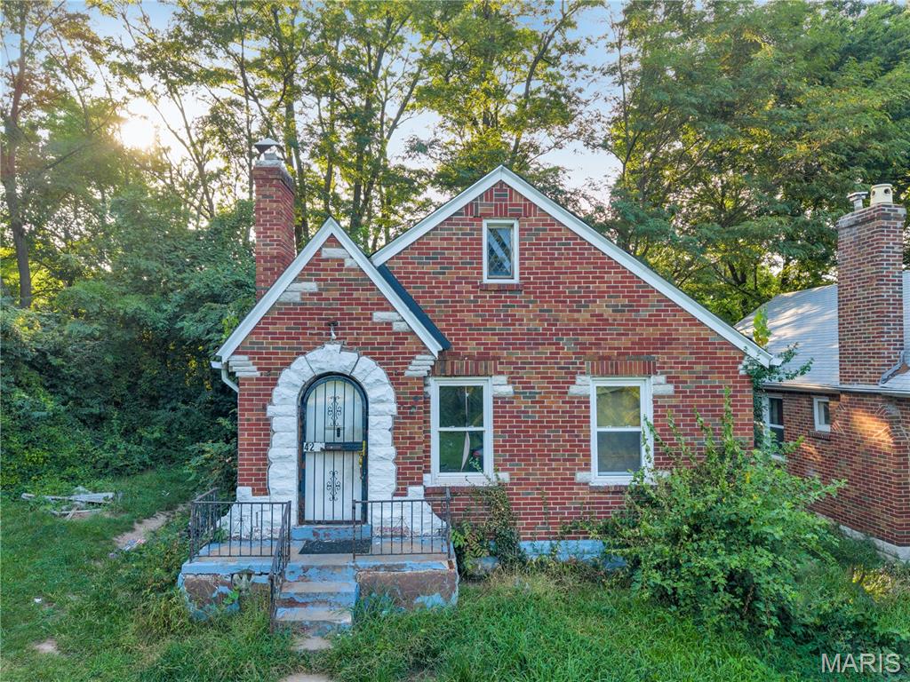 Weewoo weewoo! Investor friendly alert. This adorable cottage style house has been home to the same family since 2014 with a lease that goes through March of 2028. They have no intention of moving anytime soon:) The house features a long driveway along the right side, a shaded backyard and potential growth with the separate lot on the left side (owned by Northwoods). Interior photos can be provided upon request. Low expenses and high cash flow opportunity with tenants paying all utilities outside of sewer for a certain amount. Sits on the top corner of a private corner between streets. This house is minutes away from the Normandy shopping center (St. Louis county workforce, social security admin, Rent One, City Jump Family Entertainment Complex, etc.). Easy access to I-70 and get downtown within 20 min, Earth City within 15, and the airport in less than 10. This is part of a 13 unit single family portfolio sale all located around this area and at this price point. Can be sold individually or with the rest - See Supplements.
