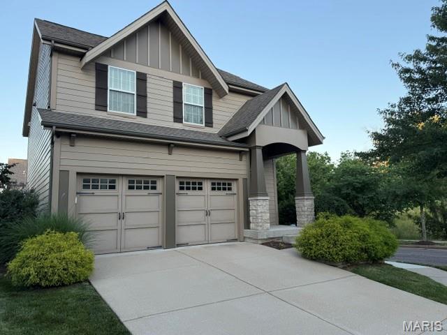 Irresistible price improvement! Sophisticated design, maintenance-free lifestyle and an ideal location in Wildwood's Town Square area--what more could you want? This stunning, move-in ready McBride-built home in the Rockwood School District features a wonderful open floorplan, lovely Craftsman-style architectural details and loads of natural light. The welcoming foyer leads to an open great room with 9-foot ceilings and large windows. A quartz-topped  island separates the kitchen, with newer backsplash, 42" custom cabinetry, designer corbels and stainless appliances. The separate dining room features arched doorway, lovely columns, a tray ceiling and looks out at the lovely cedar deck and level backyard--just made for entertaining! A newly-updated laundry includes gorgeous custom cabinets. Upstairs, the large primary suite is a welcome retreat, with tray ceiling, walk-in closet and updated bathroom with soaking tub, separate shower and custom storage. Two additional bedrooms boast walk-in closets, with newer carpeting throughout the second level, and  a hall bathroom nearby. The lower level is ready to be finished; with egress windows, roughed-in plumbing for a bath, and ample space for rec room/media room, office or additional sleeping quarters. An oversized 2-car garage and newer HVAC complete this wonderful property, located on a quiet cul-de-sac across from common ground. Best of all, Grover Crossing offers convenient, maintenance-free living--all exterior maintenance, including the roof and landscaping are the responsibility of the HOA. Wildwood's Town Square community offers ever-expanding retail and restaurants just a short walk away, and the nearby Rockwood Reservation wildlife conservation park puts trails and bike paths at your fingertips!
