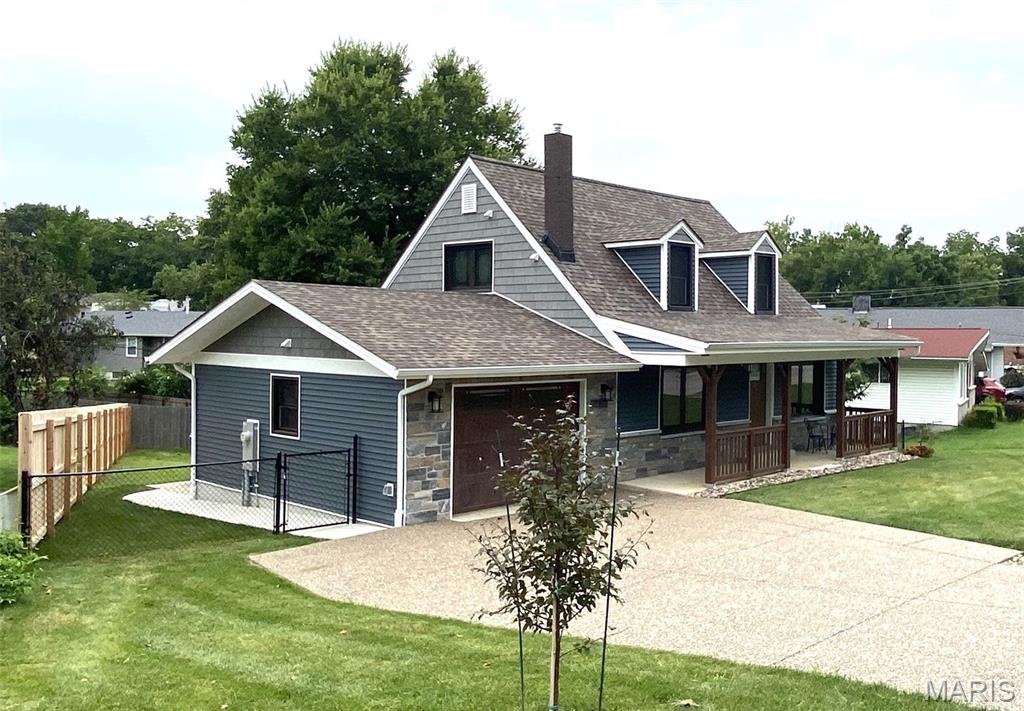 PRICE REDUCTION on This 4-Bedroom, 3-Bath One of a Kind "Dream Home" is a full custom whole house transformation. A virtually brand new home, two years in the making. An absolute Must See! No expense spared on the highest quality of materials.  Wonderful Lindbergh Schools location, 2-Blocks from Grants Trail and One Block to Crestwood Swim Club.  Full designer kitchen, custom built 1/4-sawn oak shaker style cabinets, farmhouse sink, direct vent "cooks" range hood, marble counter tops and back splash.  The custom built front porch is deep and wide to enjoy and adds versatile space to keep you cozy and comfortable. Open the front windows on cool days and feel the shaded breeze! Three custom tiled full bathrooms, one on each level. High end wood grained prairie styled windows throughout. A Children's "book nook room" and finished "eaves" storage upstairs. The front fascia is genuine granite. The newly built 1.5 carriage house styled garage has Electric Car Charging Outlet, 24-inch soffits, craftsman windows, insulated garage door, fully finished and insulated. Built so you can use the garage as a BBQ party space with access to BBQ patio. You will find so many other terrific elements; An open living room connected to the front versatile room and Kitchen. A walk-out lower level leads to a 3-season room and privacy fenced back yard. Two patios, one for entertaining and one for BBQ/Grilling off the kitchen. This home was created with the design elements of a family 1938 Cape Cod style home near Kennebunkport Maine. Now with "every" modern convenience, and highest quality elements possible.  Landmark Pro "Certainteed" architectural roof, casement windows and marble window sills on the main level. 9" luxury plank flooring, all new doors, high efficiency Heating and A/C.  New 40 gallon gas water heater. "ALL" electric is brand new, New 200 Amp service with underground cable and internet cable access port, and recessed lighting throughout. "ALL" plumbing is brand new including all water lines, drain lines, new sump pump and drain tiles in basement. New cement patios in the back and new sidewalk along garage and pebble coated driveway.  A commercial grade epoxy floor in lower level leads to the 3 season porch and walk out. New cedar fencing and black chain link fencing with gates on both sides, recessed lighting on custom designed front porch, electric outlets on all sides of home include holiday lighting outlets on porch roof.  SO MUCH MORE!