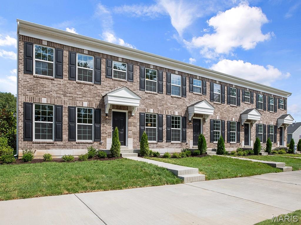 New McBride Homes row home w/2BR 2.5BA will be ready this summer! Perfect for your lifestyle, this unit offers an open floor plan w/ bright, spacious living room, ceiling fan & extra window for added natural light. Kitchen features a peninsula w/extended countertop, 42” Brellin White cabinets, quartz countertops, & GE stainless steel appliances. Breakfast room w/sliding glass door. Main level includes a half bath & wood laminate flooring. Upstairs 2 large bedrooms each w/walkin closets and private bathrooms, plus a laundry area with linen closet. Full basement and rear-entry 1-car garage included. Low maintenance community w/irrigation system for your yard! Harvest features nature play area w/water feature, 13+ acre town square & civic lawn area, food truck court, orchards & pumpkin patch, community gardens, pickle ball & bocce ball courts, playgrounds, trails & more! Enjoy peace of mind w/ McBride Homes 10 year builders warranty & incredible customer service! Similar Photos Shown.