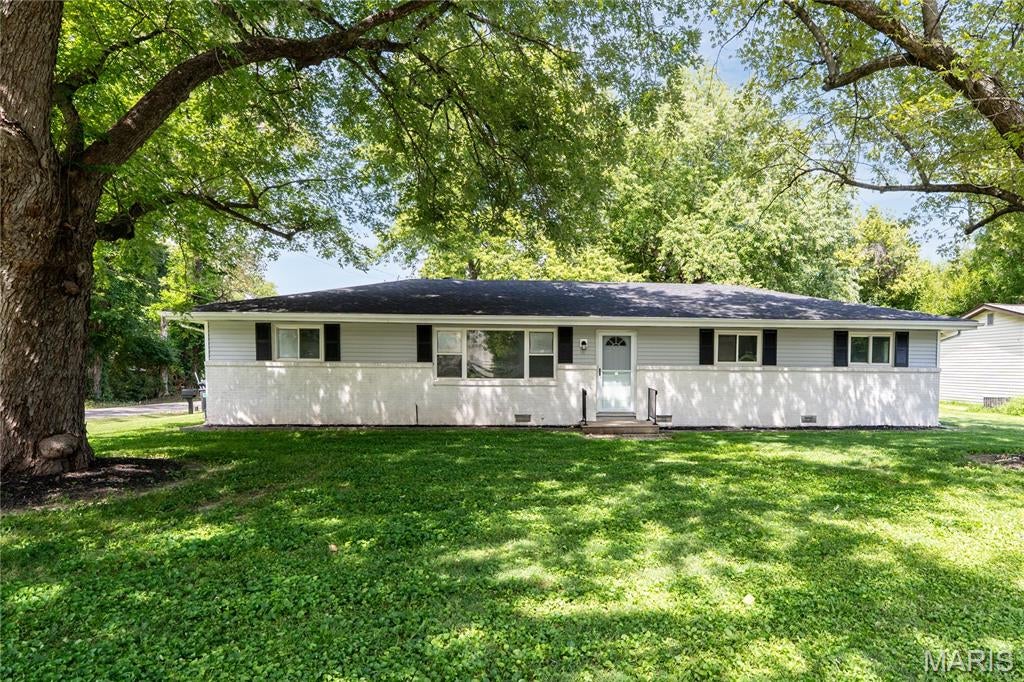 This wonderful 3-bedroom, 1½-bath home sits on a large corner lot and is move-in ready with plenty of recent updates throughout. Inside, you’ll find a comfortable living room, dining room, and an updated kitchen featuring new cabinets and new appliances. New flooring and paint throughout the entire home gives the space a fresh, updated feel. The home also features a full bathroom plus a convenient half bath in the primary bedroom. Outside, the spacious corner lot provides plenty of room to enjoy, attached 1 car garage, along with a large shed in the backyard for additional storage. Other major improvements include a new roof, adding even more value and peace of mind. This charming home has been nicely updated, is ready for its new owners, and will pass city occupancy. Schedule your showing and come see everything this home has to offer!