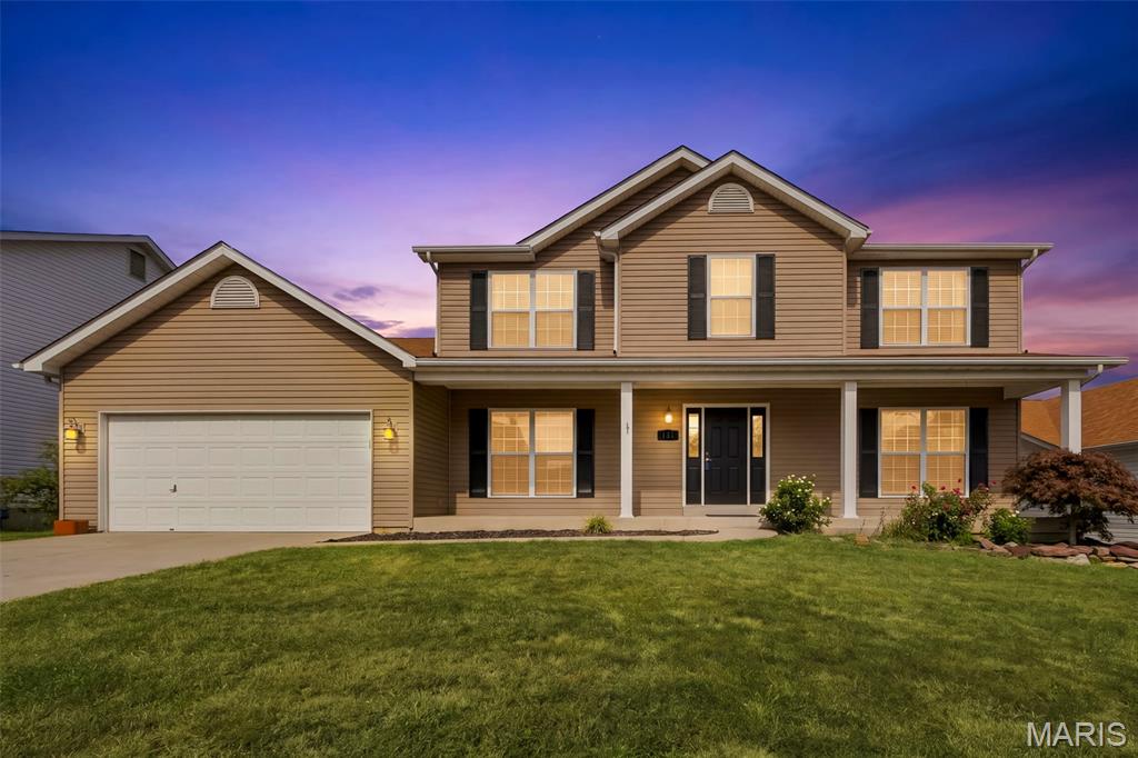 Welcome to 131 Majestic Lakes Blvd! This spacious 4-bedroom, 2.5-bath home offers a functional layout with plenty of room to spread out. The main level features a cozy wood-burning fireplace, convenient main-floor laundry, and easy access to the covered back deck—perfect for relaxing or entertaining. All four bedrooms are located upstairs, keeping the living and sleeping spaces nicely separated. The walkout basement provides additional space and plenty of potential for future finishing, storage, or recreation. A great combination of space, comfort, and functionality! 
*photos have been virtually staged to show home's potential*