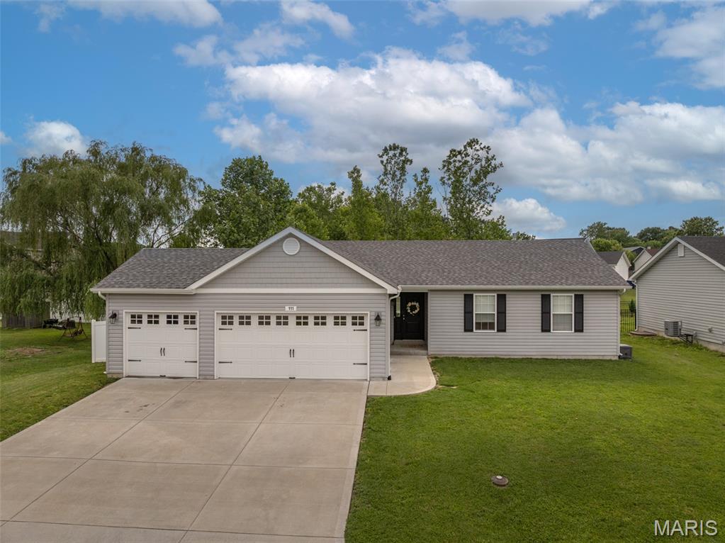 Like-New & Move-In Ready in a Fantastic Location! This beautifully maintained 3BR/2BA ranch home offers modern style, functional living, and room to grow. The vaulted open floor plan features luxury vinyl flooring throughout the main living areas, newer paint, main floor laundry, and abundant natural light. The kitchen is designed to impress with granite countertops, center island, stainless steel appliances, walk-in pantry, soft-close cabinetry, and crown molding finishes. The spacious primary suite and additional bedrooms provide comfort and flexibility for everyday living. The unfinished lower level includes an egress window and bath rough-in, offering endless possibilities for future living space, recreation area, home office, or additional bedrooms. Outside, enjoy the oversized 3-car garage, privacy vinyl fencing, and patio area perfect for relaxing or entertaining. This home combines newer construction, modern finishes, and a convenient location all in one package!