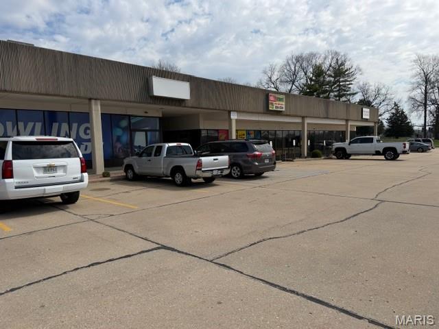 Versatile 1,500 SF lease space in a prime location offering great traffic and visibility.  Perfectly suited for various purposes, whether for office, retail, or service use. Large off-street parking lot and exterior signage. (2.00)