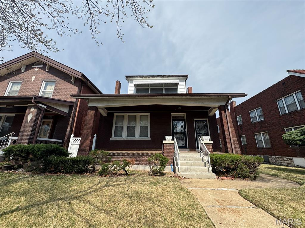 Introducing 5381 Queens Avenue, a unique value-add opportunity with flexibility for both owner-occupants and investors. This spacious home offers a versatile layout that could easily function as a single-family residence or be converted into a duplex. The main level features 2 bedrooms, a full bath, and a kitchen, while the upper level includes an additional bedroom, living area, kitchen, and full bath. The walkout lower level adds even more potential with a full bathroom already in place. With solid bones, ample living space, and endless possibilities for renovation or income generation, this property is ideal for investors, house hackers, or buyers looking to build equity through updates. Conveniently located with easy access to major highways, shopping, and public transportation. Property to be sold as-is.
