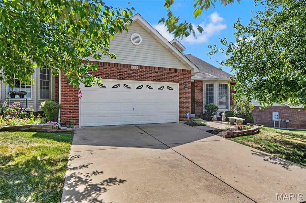 Maintenance free living at its finest!  This beautiful villa has so much to offer.  Newer flooring throughout most of the main living area.  Large great room and dining room area.  Tons of cabinet and countertop space in the spacious eat in kitchen.  Sliding glass door out to deck with Sunsetter awning for some shade anytime.  Master bedroom and bath with separate soaking tub and shower and walk in closet.  Main floor laundry.  Second bedroom or office space and an additional full bathroom with walk in jetted tub and shower round out the main floor.  Love to entertain?  The walkout lower level is a great spot for that.  Massive great room with fireplace and kitchenette area with large island make this a great space for hosting family or friends. Additional bedroom and full bathroom round out the finished basement area.  Plenty of storage space in the unfinished area.  Two car garage with opener.  This is a great spot!  Come and see it before it is gone!