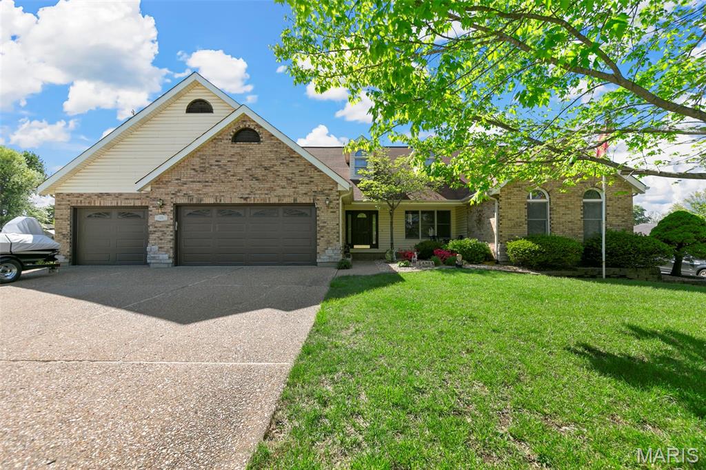 Beautiful, Large, brick ranch in the heart of Downtown Wentzville sitting on a half acre lot with 3 car garage!! Home has been very well taken care of and is in move in condition. You could do a few updates if you want but not needed to move right in and enjoy this rare find. Nice open floor plan with huge vaulted great room with brick gas fireplace. Private 13X10 office with hardwood floors. Huge kitchen with vaults, skylight, lots of cabinets, center island, wood floors, breakfast room that leads to a wonderful large 3 season room. Large dining room with hardwood floors, vaulted & a 4 window bay. Huge primary bedroom with French door bay area that leads to large deck, large walk-in closet & luxury bath w/huge soaking tub, separate shower & double sink plus skylight. 2 other very good-sized bedrooms with large hall full bath w/ double sinks. Large main floor laundry with cabinets and a large closet. Partially finished walk up lower level with a huge family/game room a 3rd full bath and a large hobby room/sleeping area. Large deck out back that overlooks your large, level, fenced ½ acre lot. Just FYI seller had a city permit approved for a 12X24 outbuilding so buyer should be able get an outbuilding approved if desired.