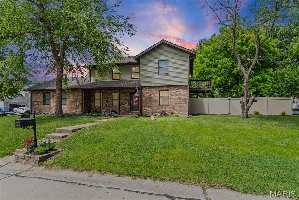 ** OPEN HOUSE CANCELED SATURDAY 27th ** Welcome home to this beautifully updated 3-bedroom home with a 4th nonconforming bedroom in the finished basement, offering over 2,500 square feet of living space and whole kitchen remodel! Featuring 4 bathrooms, stylish upgrades throughout and a spacious floor plan designed for comfortable living, this home has something for everyone.  There are 2 wood burning fireplaces to get cozy in the winter and a huge and fenced in backyard for summer BBQS. The primary suit is a true retreat with dual walk-in closets, a private entry to the back yard decking area, and a private en-suit bathroom.  Outside enjoy the large fenced in backyard with premium vinyl fencing, perfect for entertaining, pets, or play!  Situated on a corner lot in a quiet and sweet neighborhood within a highly sought-after school district, this home combines space, comfort and location all in one package!  AGES: Roof 2024, A/C 2023, Furnace 2023, UV light for water system and reverse osmosis system in 2023 and added insulation in attic.   Schedule your private showing today with your favorite Realtor!
