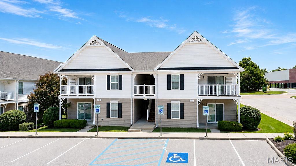 Enjoy easy, low-maintenance living in this desirable ground-floor corner unit offering 2 bedrooms, 2 full baths, and over 1,000 sq ft of comfortable living space. This well-maintained condo features an open floor plan with spacious living and dining areas, hardwood flooring, ceramic tile, and a breakfast bar perfect for casual dining or entertaining. The primary suite includes a walk-in closet and private bath, while the second bedroom and full bath provide flexibility for guests or a home office. Convenient main-floor laundry is located inside the unit. Relax on the covered patio and enjoy the added privacy and natural light that comes with a corner location. Community amenities include an in-ground pool, water, sewer, trash, snow removal, and exterior maintenance, making ownership simple and stress-free. Conveniently located near shopping, dining, and Highway 30 for an easy commute. Move-in ready and waiting for its next owner.