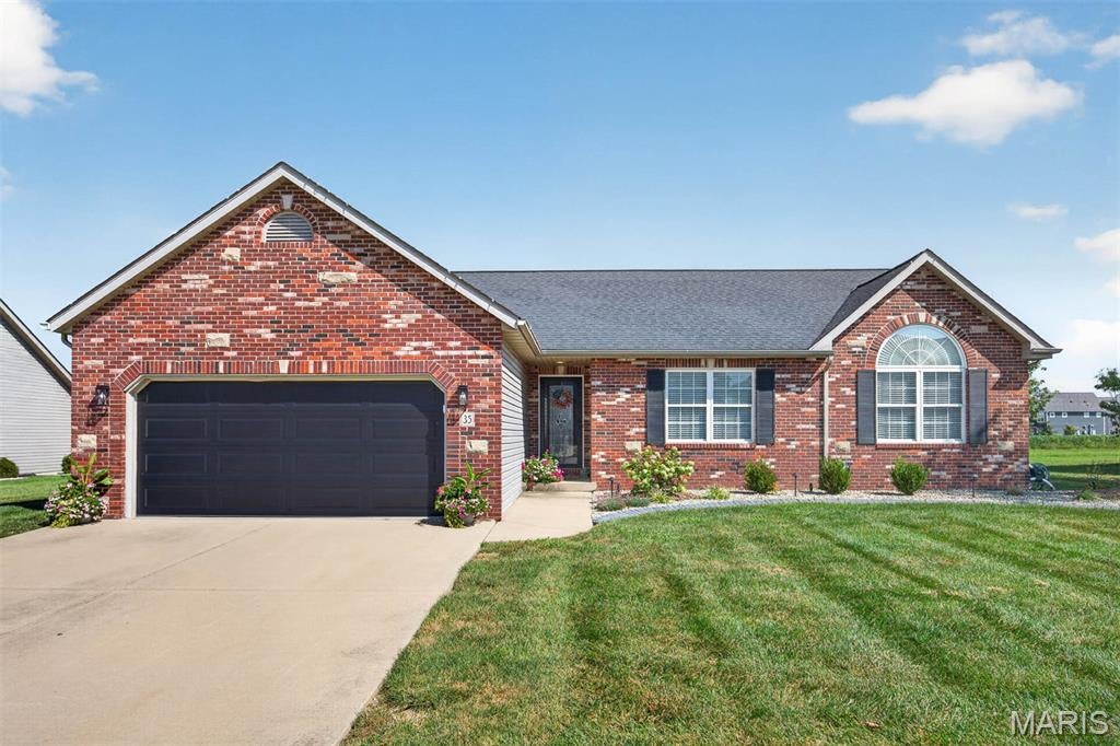 Welcome to 35 Whistling Straits Drive, situated in the beautiful Augusta Estates neighborhood in Highland IL and conveniently located to all amenities! This phenomenal ranch home offers 3 bedrooms, 2 full baths, a full basement, and a level, fenced backyard with so much to love!
Step inside the welcoming foyer and immediately be impressed by the gorgeous LVP flooring flowing throughout the home. The spacious living room is filled with natural light and highlighted by a vaulted ceiling and cozy gas fireplace. The beautifully remodeled kitchen (2024) is sure to impress, featuring a large center island, quartz countertops, under-cabinet lighting, freshly painted cabinetry, and stainless-steel appliances! Ceiling in Kitchen, Living Room & Hallway also painted!
The HUGE primary bedroom boasts a walk-in closet and spacious En suite with a separate tub and shower. Two additional generously sized bedrooms and a full hallway bath and laundry room complete the main floor.
Ready for even more space? The full basement offers tremendous potential for future expansion with 3 egress windows and rough-in plumbing, just waiting for your finishing touches!
Outside, enjoy the spacious, fenced backyard and fantastic covered patio featuring a beautiful wood ceiling and ceiling fan—perfect for relaxing or entertaining! Additional upgrades include front exterior up-lighting, new landscaping in both the front and backyard, a new full-view front door & new garage door. Beautifully updated, wonderfully maintained, and located in one of Highland’s desirable neighborhoods, this is a fantastic opportunity you won’t want to miss!  Schedule your showing today! Roof 2017, A/C 2022.