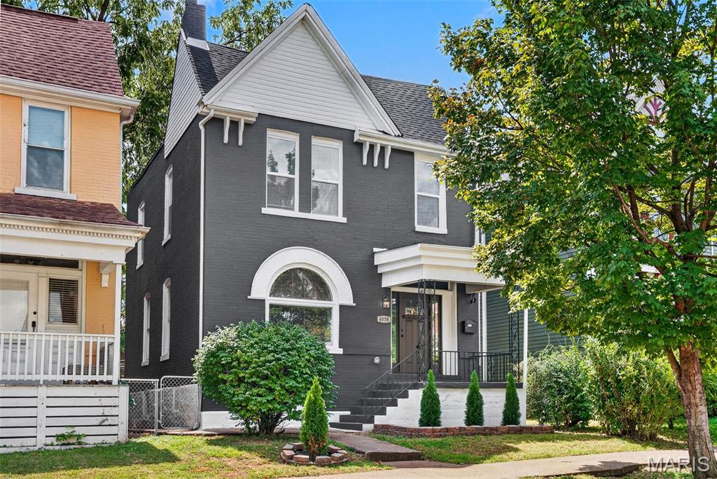 Don't miss out on this fabulously updated 4 bed, 2.5 bath home in the heart of Tower Grove South- NOW WITH A NEW KITCHEN LAYOUT!

From the covered front porch, step in to the welcoming entryway featuring a grand staircase. The spacious living room showcases a charming arched window full of character. The dining room flows seamlessly into the beautifully updated kitchen that offers luxury tile work, stainless steel appliances, and stainless steel hood, as well as an eat-in island. A convenient half bath rounds out the main floor, making this space perfect for entertaining.  Upstairs you’ll find all the convenience of a modern layout with 4 bedrooms and 2 full baths. The primary suite boasts a fully updated private bath with luxury tile work and double sinks. The hall bath has also been fully renovated and features a bathtub as well as luxury tile work and stylish light fixture. Additional features include an walk-out basement, fenced backyard, and 2-car parking pad in the rear. Plus you can enjoy peace of mind with a new roof, several new windows, new HVAC, and new electric hot water heater. 2 blocks from Tower Grove Park, this home is walkable to favorite spots like Gustine Market, Hartford Coffee Company, and Fleur de The.
