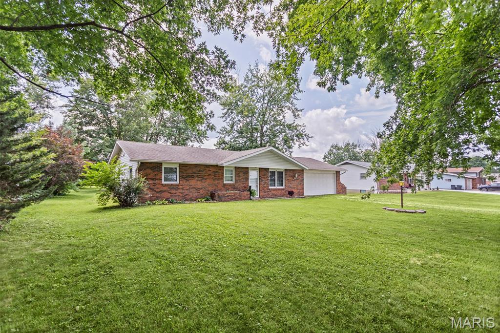 Welcome home to this charming 3-bedroom, 1-bath property located in a highly desirable area just outside of town! Enjoy the peaceful feel of country living while still being only minutes from local conveniences. Surrounded by well-maintained homes, this location offers the perfect balance of privacy and accessibility.
Inside, you'll find a beautiful kitchen that's ready for everyday living and entertaining. The large enclosed sunroom at the back of the home offers a versatile space to relax, entertain guests, or enjoy views of the backyard.
Outside, the shady backyard features mature trees, creating a peaceful setting for entertaining, gardening, or simply enjoying the outdoors. A 2-car garage provides plenty of space for parking, storage, or a workshop.
Conveniently located just minutes from the fairgrounds, this property offers a wonderful combination of comfort, location, and charm. Don't miss your opportunity to make this home your own!