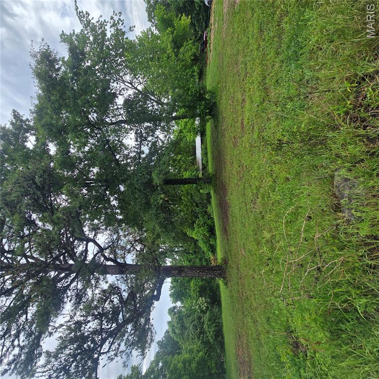 Come and build your dream home on this spacious level /gently sloping lot in Jefferson County. This land offers almost 2.5 acers of land that has electric, well and septic utilities already on site.  This unrestricted property is located on a corner lot that offers the perfect amount of seclusion and ease. Located on the property is a garage and manufactured home that can be used or removed giving you endless possibilities. Come and set up a time to view this awesome property today!