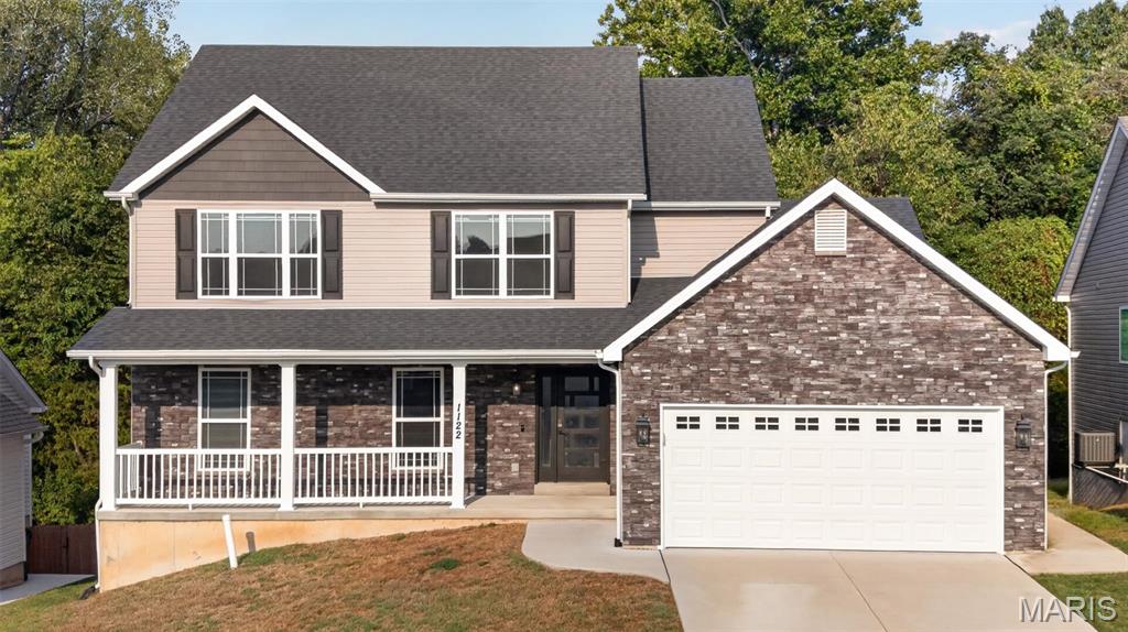 Welcome home to this beautiful, modern 4-bedroom, 2.5-bath home in the Festus School District! Only 3 years old, this home offers a bright, spacious layout filled with natural light and stylish finishes throughout. The main level features a separate dining room, inviting living area with a gas fireplace, and a gorgeous kitchen with dark cabinetry, stainless steel appliances, ample counter space, and an open flow perfect for everyday living and entertaining. Smart-home features add convenience, including Lutron Caseta switches/outlets throughout much of the main level, smart shades, and Ecobee thermostats—all compatible with popular smart-home platforms including Apple HomeKit and Google Home. Upstairs you'll find 3 bedrooms, a full bath, walk-in closets, and a HUGE loft offering endless possibilities as a playroom, home office, second living room, or lounge area. The unfinished walk-out basement is clean and ready for your finishing touches, providing the opportunity to add even more living space. Outside, enjoy a covered front porch, upper deck, and a backyard that backs to trees for a more peaceful setting. Modern, spacious, smart, and move-in ready—this home has so much to offer!