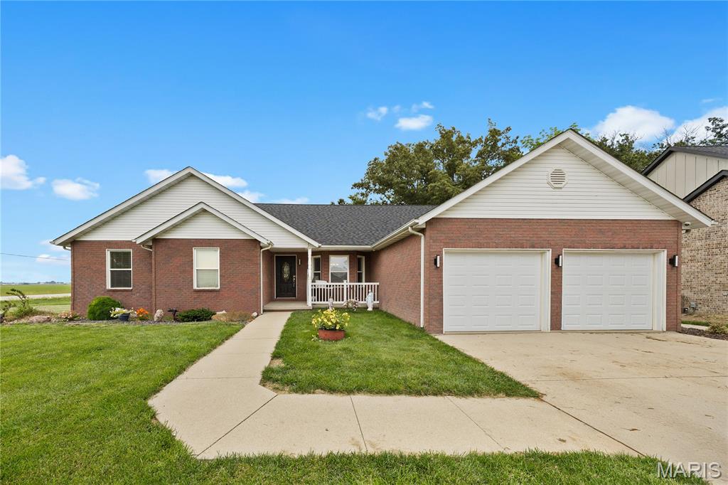 Open House on Sunday, June 7th from 1-3.  This well maintained home sits on 1/2 acre in the highly desirable Woodcrest Estates.  This 3 bedroom, 3 bath home on a corner lot has lots to offer.  New Flooring in 2024, Roof 2023, New Appliances 2024!  If you have pets, you'll love the vinyl fenced back yard that also comes with dog kennels and has a large gate for getting things in and out of the back yard. The lower level has a family room, bathroom, and lots of storage space.  There are also two egress windows if you'd like to add an additional bedroom.  A backup system has also been added to the sump pump. Conveniently located near the YMCA and HSHS Hospital!  Short walk to the soccer park, dog park, and Hannah's playground.