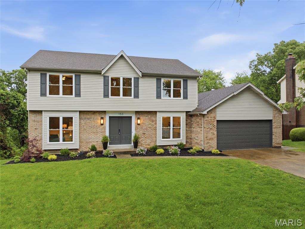 Welcome home to this stunning renovated two-story, perfectly situated on nearly an acre within the award winning Parkway School District.  Offering more than 3500 total living sq ft, this beautiful home exudes brand new luxury in an established, sought-after neighborhood.  Featuring 5 bedrooms and 4 baths (3 full, 1 half), this home provides large, open spaces perfect for today's living. As you enter the foyer, you are greeted with a light-filled office and a spacious dining room.  The great room shows like a display with beamed ceiling, built-ins flanking the fireplace, a gorgeous wet bar, wall of windows and a door (and views) to the expansive brand new deck and private yard.  Beautiful new kitchen with quartz counters, striking backsplash, gas range, built-in microwave, undercab lighting and a delightful island with seating. Breakfast room (with new french doors to the deck) and pantry expand the practical living of this home. A main floor laundry room is accessed from the kitchen or the 2-car garage. Upstairs is a large landing area leading to the spacious primary bedroom and a show-stopping primary bath with dual vanities/sinks and shower. Three more bedrooms and a huge hall bath complete the second level.  The lower level continues the living space to include a large living/entertaining room with bar, built-ins and walk-out to the patio. A hallway off the basement stairway leads to the absolutely enormous bedroom with double windows and a full bath. Perfect for a teenager, parent or extended family. New windows throughout the home, new doors, new light fixtures, new flooring, new electrical panel, new plumbing ... gosh, most everything is brand new!  The privacy (whether enjoying the huge new deck or in the backyard) is special. Don't miss this one!
