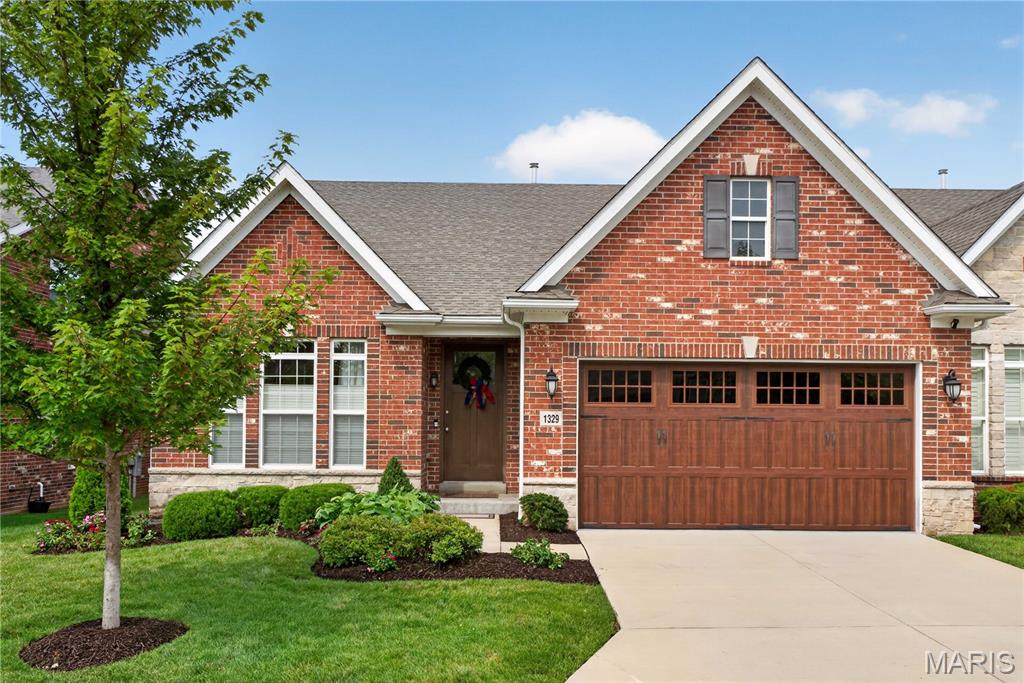 Simplify without sacrificing the lifestyle you love at The Arbors at Frontenac, where refined, carefree living meets a serene setting just moments from premier shopping, dining, and everyday conveniences. Exceptional craftsmanship and thoughtful attention to detail are evident throughout the community, from custom carriage-house garage doors and full brick-and-stone masonry to professionally landscaped, park-like grounds with irrigation systems. 1329 Cordata is ideally positioned on the community’s private westernmost side. Its east-facing orientation and abundant southern exposure fill the vaulted interiors with natural light, highlighting wide-plank hardwood floors, designer finishes, sophisticated fixtures, and a gourmet kitchen that flows seamlessly into the elegant great room with a gas fireplace and French doors to a secluded deck. The main floor features a primary suite with a spa-inspired bath and walk-in closet, along with an additional bedroom, full bathroom, and dedicated office and laundry. The beautifully finished lower level offers a spacious recreation room, guest suite, and abundant storage. Custom closets throughout pair elevated design with outstanding functionality. Simplify beautifully at 1329 Cordata while preserving the sophistication, quality, and lifestyle you value most.