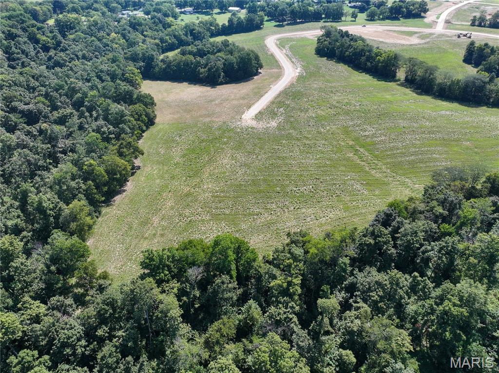 Privacy, acreage, and convenience are hard to find this close to Jackson! This secluded 20± acre tract in Kinder Farms Subdivision offers an attractive combination of mature timber and open ground, providing an excellent setting for a private homesite tucked away from the road. With plenty of room for a home, shop, barn, pasture, and recreational use, the possibilities are wide open. Livestock, horses, and outbuildings are permitted, and electric and water are available. Bring your own builder and design the country property that fits your needs. Light restrictions will apply. Located approximately 3 miles from Jackson Schools, you can enjoy privacy and country living while remaining just minutes from town.

A survey will be completed prior to closing to determine the exact acreage. Final purchase price will be based on the surveyed acreage and the agreed-upon price per acre.