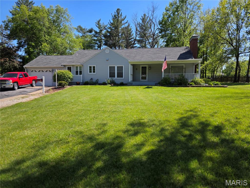 Spacious, stylish, and full of charm — this beautifully maintained 1.5-story ranch offers room for everyone inside and out! Featuring 3 bedrooms on the main level plus a private upper-level bedroom suite, this home combines functional living with warm, inviting spaces throughout.
Step inside to gorgeous hardwood floors flowing through the oversized living areas and bedrooms, highlighted by a stunning gas fireplace that creates the perfect gathering space. The large primary bedroom offers comfort and privacy, while the updated primary bath features double sinks and a walk-in shower. A separate dining room provides the ideal setting for family dinners or entertaining guests.
The kitchen offers abundant cabinetry, stainless steel appliances. Relax year-round in the bright 3-season porch overlooking the backyard retreat.
Outside, enjoy a mostly privacy-fenced backyard with mature trees, a basketball court, extra storage sheds, large deck space, and plenty of room to entertain, play, or unwind. Enjoy a peaceful setting with both open yard space and shade.
This move-in ready home offers the perfect combination of space, comfort, and outdoor enjoyment — all wrapped into one beautiful property!