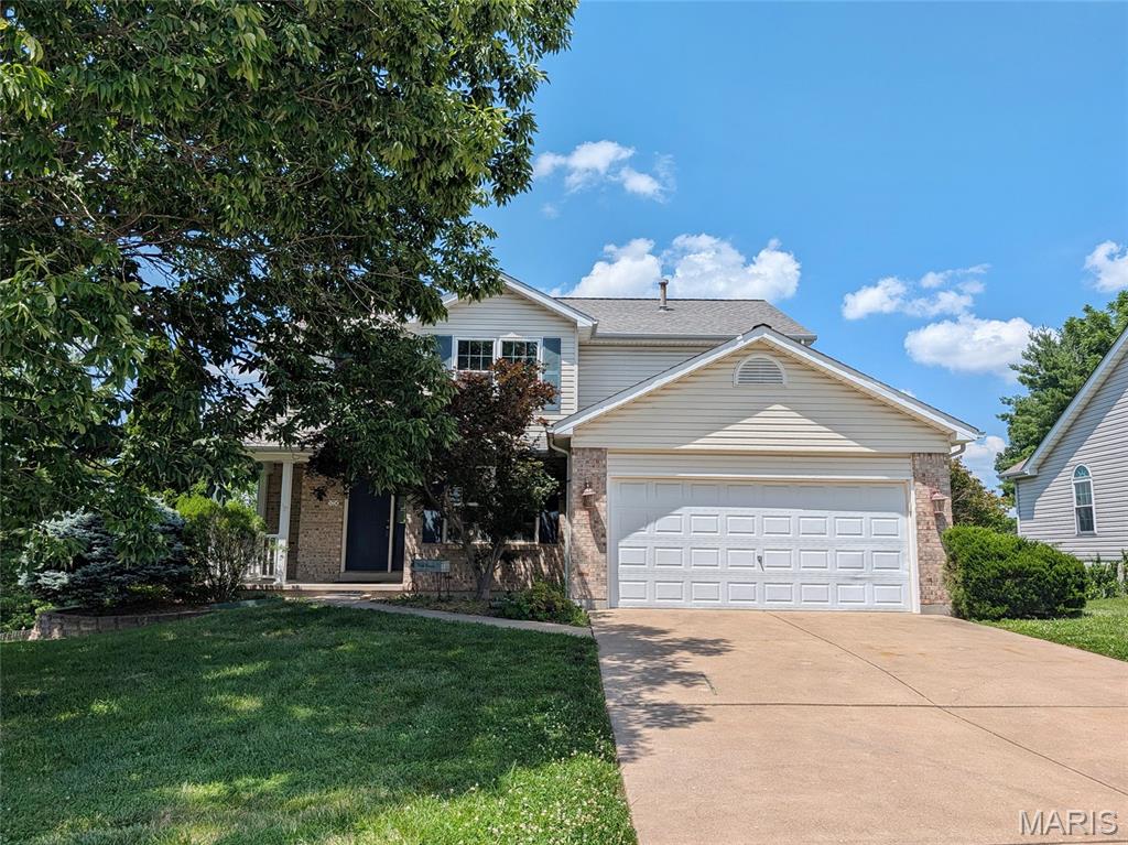 Spacious two story home with an attached two car garage! Special features include: wood floors, great room with fireplace, bay window, open two story entry, updated carpet, and much more!  Main floor has living room with built-in book shelves, kitchen and breakfast area, separate dining room, half bath and main floor laundry. Second floor has two full baths, three bedrooms and a media area on the second level. Lower level has family room, bar area, bedroom and full bath. Freshly painted, wood floors and new carpeting, ready for a new owner! Exterior has walk-out lower level, exceptionally large deck, patio off lower level, vinyl siding and located on a cul-de-sac!  Show, sell and move in, easy to show, set your appointment today!
Some photos have been virtually staged.
