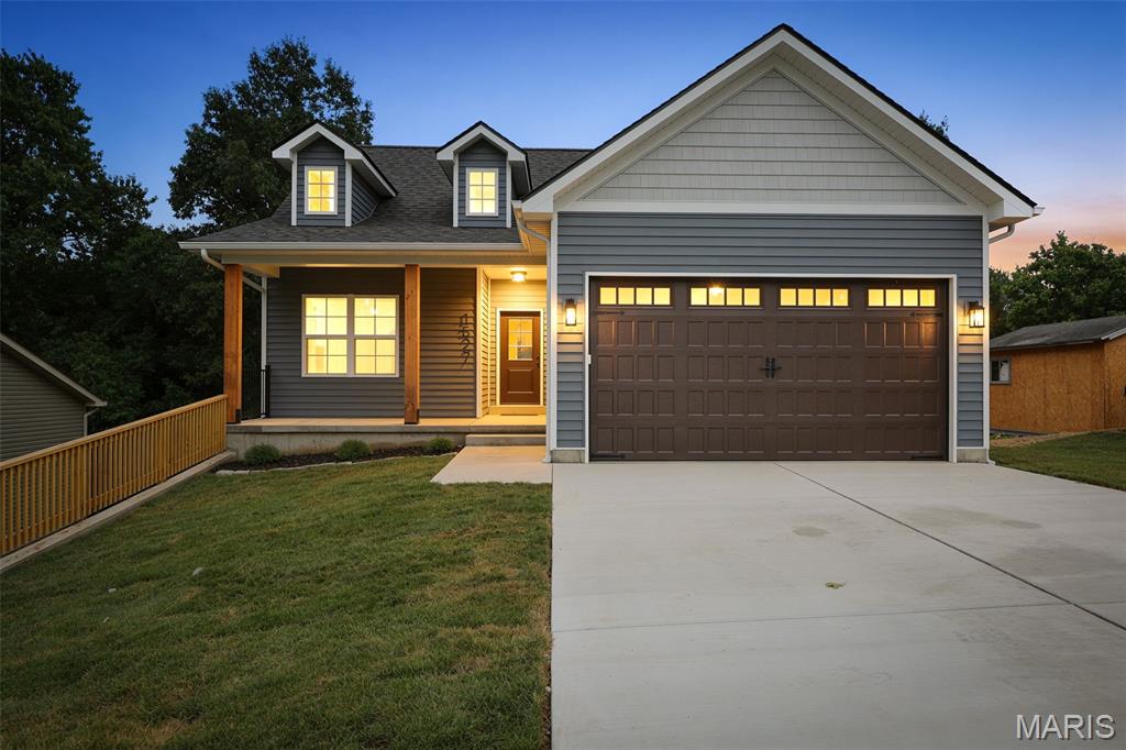 Welcome home to this beautiful new construction in the heart of De Soto! Situated on a large city lot in a quiet, established neighborhood, this thoughtfully designed home offers 2,067 square feet of finished living space with 4 bedrooms and 3 full bathrooms.

The open-concept main level features quartz countertops, a spacious kitchen with all kitchen appliances included, a walk-in pantry, and a convenient main-floor laundry room. The private primary suite offers a large walk-in closet and a beautifully appointed bathroom with a walk-in shower.

The finished lower level features an expansive family room perfect for entertaining, along with additional bedrooms and a full bathroom, giving everyone plenty of space to spread out. You'll also appreciate the utility room, providing excellent storage and functionality.

Built with comfort and efficiency in mind, this home includes an upgraded 80-gallon heat pump water heater for exceptional energy savings. With modern finishes, quality craftsmanship, and an ideal location close to schools, parks, and everyday conveniences, this move-in-ready home is one you won't want to miss. Schedule your private showing today! Property is agent-owned.