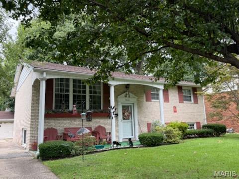 Welcome home to this inviting 3 bedroom, 2 bathroom split level home featuring comfortable living spaces and plenty of room to enjoy both indoors and outdoors.  The lower level offers a large family room - perfect for gatherings or a comfortable movie night.  This family room, bathroom and spacious storage adds a great space for entertaining or hobbies.  
Step up into the living room/dining room open floor plan, a kitchen with wood cabinetry, a snack area complete with appliances.  Three bedrooms and a full bath.  Now step onto the nice wood deck - great for morning coffee or your private getaway.   The yard is charming, shaded and comfortable.  The convenient 2 car garage, ample parking, a covered front entry,  upper level living/dining and lower level family room offers many options.  It is a welcoming setting and immaculately maintained along with a private cul-de-sac lot.  You won't want to miss this lovely home.