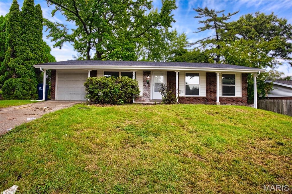 Discover a completely remodeled single-family residence at 3535 Brookstone Drive in Florissant MO 63033. Built in 1963, this property has undergone a comprehensive transformation, offering an updated interior that seamlessly blends classic ranch style with contemporary living. The recently updated kitchen is a culinary delight, featuring gleaming stainless steel appliances and sophisticated stone counters, creating an ideal space for both everyday meals and entertaining. Among the four bedrooms, one offers the convenience and privacy of an ensuite bathroom, providing a tranquil retreat. Further enhancing this home's appeal are the practical amenities, including an attached garage for ease of access and storage, a private yard perfect for outdoor enjoyment, and a welcoming patio for relaxation. This meticulously updated home presents an exceptional opportunity to embrace a refreshed lifestyle.