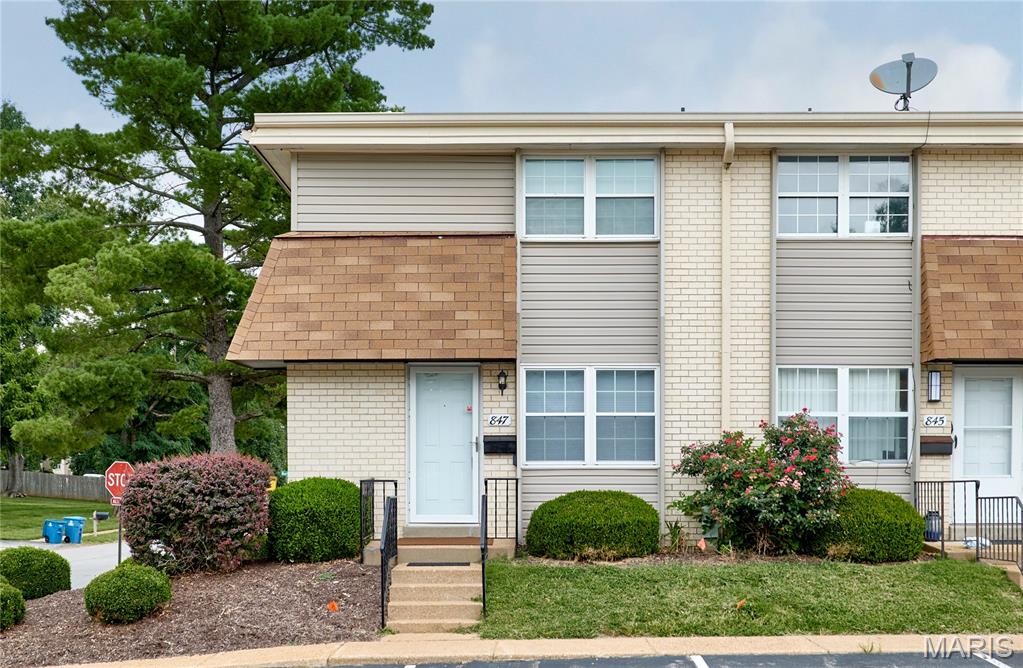 Located in the heart of Ballwin, this beautifully maintained sought-after end-unit three-level townhouse offers the perfect blend of comfort, style, and low-maintenance condo living. From the moment you step inside, you'll appreciate the light-filled open floor plan.

The tastefully recently updated kitchen features warm cabinetry, coordinating countertops, and stainless appliances, including a brand-new dishwasher. Even better, all appliances stay, making this home truly move-in ready. Both the kitchen and bathrooms have been thoughtfully updated over the past 10 years with timeless finishes that blend style and functionality.

Major mechanical and system updates provide exceptional peace of mind, including a completely updated electrical system (2024), a 2-year-old HVAC system and water heater, and updated windows for improved comfort and energy efficiency. Newer carpeting and a recently painted interior give the home a fresh, inviting feel throughout.

The finished lower level offers valuable additional living space with endless possibilities for a recreation room, home office, workout area, or a combination of all three. Step outside to your own private enclosed patio, complete with a new fence, creating the perfect outdoor retreat for relaxing, entertaining, or enjoying your morning coffee.

Upstairs, you'll find two spacious bedrooms designed with comfort in mind, featuring rich, serene colors, beautiful flooring, generous closet space, and a convenient Jack-and-Jill full bath accessible from both bedrooms.

As one of the community's desirable end units, this home offers added privacy, extra natural light, and an ideal location. With every major update already completed, it is truly turnkey. Enjoy all the benefits of maintenance-free condo living while being just a short walk to the community pool, shopping, dining, and parks. Welcome home to Ballwin!