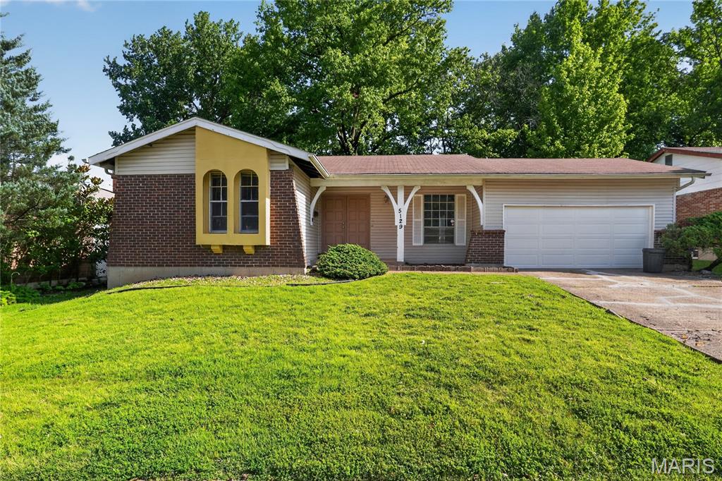 Discover the inviting charm of 5129 Longhorn TRL, FLRSSNT MO 63033, a single-family residence built in 1969. This ranch-style home offers a comfortable and convenient living experience. The kitchen is thoughtfully equipped with matching black appliances, providing a cohesive and functional space for culinary endeavors. With three bedrooms and a well-appointed bathroom, this home offers comfortable living spaces. An attached garage provides convenience, while the patio and porch offer inviting areas for outdoor enjoyment. This delightful residence offers a harmonious blend of comfort and practicality, ready to welcome its new owners.