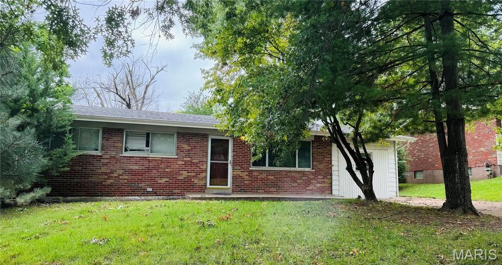 Welcome to this affordable ranch in Dellwood, featuring 3 bedrooms and 1.5 baths! As you step inside, you'll be greeted by original hardwood floors and abundant natural light. The spacious living room leads to an eat-in kitchen with plenty of cabinets, a pantry, and a cozy breakfast area. The bedrooms are well-sized with hardwood floors, and the master bedroom includes a convenient half bath. 
Enjoy summer nights in the large, fenced backyard—perfect for relaxation, entertaining, and your furry friends. The finished lower level offers ample space for family gatherings, and the former one-car garage has been converted into an additional family room.
The property is being sold as-is, with no representations, warranties, or inspections provided by the seller.