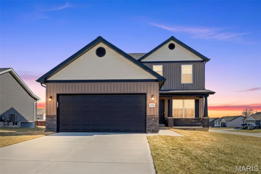 Under Construction on Lot 244 of The Shire. The Anthony Floor plan.  Beautiful brand-new two-story home offering 3 bedrooms, 2.5 baths, and 1,632 sq ft of thoughtfully designed living space. This modern build features an open-concept main level with a bright living area, stylish kitchen finishes with 42 inch shaker cabinets, Quartz counters, eat-in island and a convenient guest bath. Upstairs, includes a spacious primary suite with its own full bath with dual sink vanity and large walk-in closet.  Two additional bedrooms, and a second full bath also upstairs. All Plumbing Fixtures, Door Hardware and light fixtures have been upgraded to a Black Finish. Two Panel doors and tilt-in windows throughout. Downstairs you will find an open canvas with a full rough-in bath, sump pump and egress window for future finish. Exterior includes upgraded architectural shingles, Vertical Board and Baton Siding with shake siding in the Gables, and sill high Stone with craftsman style columns. This home will be move in ready before the end of October! Colors will vary.