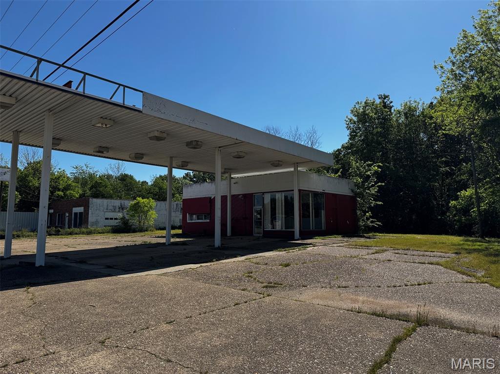 This commercial property features two buildings situated on approximately 1.5 acres, offering excellent potential for a variety of business opportunities. With high traffic exposure and strong visibility, the property is well suited for retail, office space, service businesses, storage, or investment purposes. The spacious lot provides ample parking and room for expansion or additional development. Its convenient access and prime commercial location make this a versatile property with endless possibilities for owner-users or investors alike.