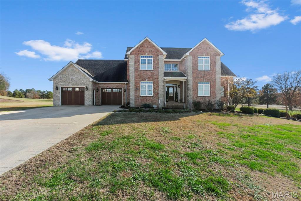 Welcome to this spacious multi-level home offering exceptional versatility, comfort, and amenities throughout.

Enter through the inviting foyer into the main level, which features a three-car garage, a den, and a living room that provide plenty of space for relaxation and gatherings. The primary bedroom and laundry room are also located on this level for everyday convenience, along with a dedicated office and a separate formal dining room.

You’ll find an impressive heated and cooled three-car garage with tile flooring and built-in cabinetry—a rare space perfect for vehicles, hobbies, or a workshop.

The lower level offers even more flexibility, with a den/living room area, a full bathroom, and an additional room ideal for a guest bedroom, gym, playroom, or storage. This level also includes another three-car parking area plus a workout space or room of your choice.

Step outside to enjoy your private backyard retreat, complete with an in-ground pool and outdoor fireplaces for year-round entertaining.

This one-of-a-kind property provides exceptional space, multiple living areas, and unmatched functionality—perfect for those who need room to live, work, and play.