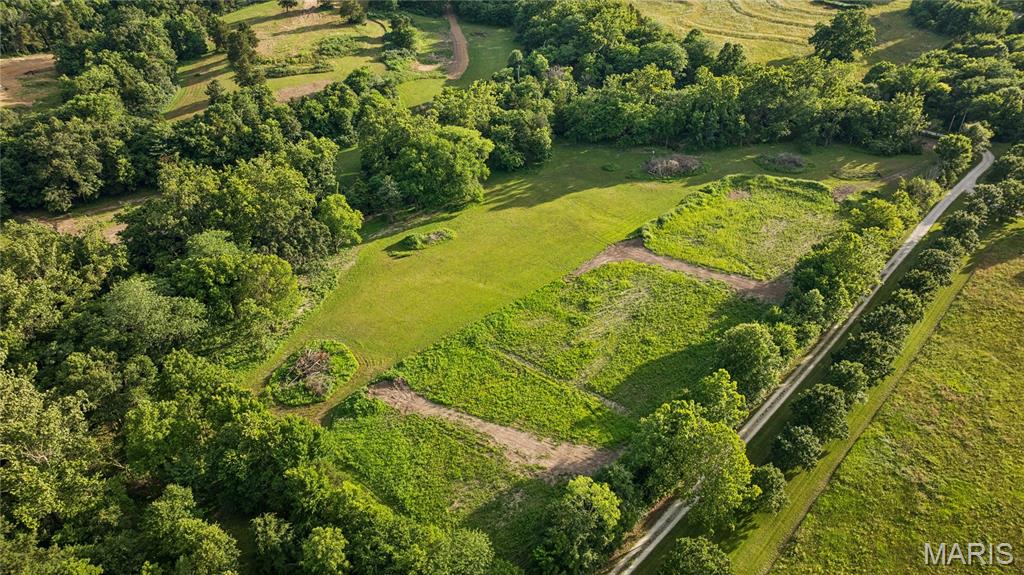 Discover the freedom to create exactly what you want on approximately 17 private, secluded acres just outside Warrenton. Tucked away from the everyday hustle and surrounded by mature trees, abundant wildlife and peaceful countryside views, this property offers something increasingly difficult to find: acreage, privacy and the freedom to build on your terms.

No HOA and no restrictions mean your vision comes first. Build the custom home you've always wanted, create a one-of-a-kind barndominium, establish a hobby farm, bring your horses, build the shop you've been needing, or create a private recreational retreat for weekends in the country. Whether you're planning to build now or simply want to secure your own piece of land for the future, this acreage gives you the flexibility to make it your own.

Even better, electricity is available, giving you an important head start when it's time to turn your plans into reality.

A small creek winds through the heart of the property, adding natural beauty, character and a peaceful backdrop to the land. Mature trees provide privacy and a sense of seclusion, while the surrounding habitat creates opportunities to enjoy wildlife, exploring, recreation and quiet evenings away from it all.

Private road access off Lix Road enhances the tucked-away setting, yet you're remarkably close to everything you need. I-70 is approximately four minutes away, putting Warrenton's shopping, dining and everyday conveniences within easy reach while allowing you to come home to your own private countryside escape.

This isn't land that tells you what you have to build. It's land that gives you the freedom to decide. Home. Barndominium. Horses. Hobby farm. Workshop. Recreation. Weekend retreat. Or simply room to breathe and space between you and the rest of the world.

Come walk the property, listen to the creek, take in the privacy and start imagining what you could create here.

Approximately 17 acres. No HOA. No restrictions. Electricity available. Private setting. Minutes from I-70 and Warrenton.

Bring your plans—and build your vision your way.