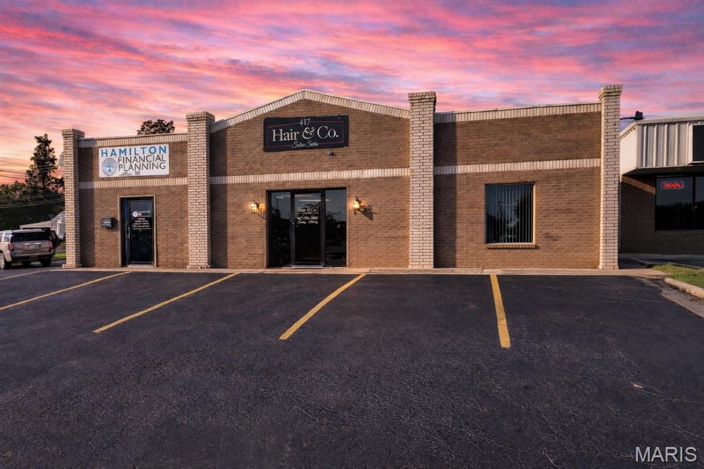 Commercial Office Building for sale - Lebanon MO Opportunity awaits with this well-maintained commercial office building located in the heart of Lebanon Missouri. Situated on a high-visibility road with convenient access to major highways, this property offers exceptional exposure and accessibility for businesses looking to establish or expand their presence in the area. This building features 3,000 sqft of versatile office space; perfect for medical/dental offices, legal practices, insurance agencies, or multiple tenant offices. Currently set up for four different office suites, all of which are at half-occupancy. There are two bathrooms in the building making it perfect for multiple tenants or a larger business opportunities. A digital ''Watchfire'' 4x8 sign with an estimated 20,000+ views a day sits on the property allowing for additional income generating opportunities. The property has central HVAC, high-speed internet connectivity, and ample parking for staff and visitors. With low maintenance fees this property is easy to manage and cost effective. Just minutes from downtown Lebanon and I-44, making it ideal for both local and regional clientele. Zoned for commercial use with strong rental potential in a growing market. Lebanon is a thriving community with a diverse economic base, including manufacturing, healthcare, education, and retail. Located along historic Route 66, Lebanon serves as a regional hub for surrounding rural communities and is experiencing steady growth in both population and business development. Whether you're looking for a move-in-ready office for your business or an income-generating investment, this property offers excellent value and long-term potential in one of Southwest Missouri's key commercial corridors.