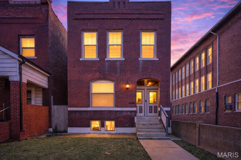 Welcome to 2026 Allen Avenue, a beautifully renovated historic home in the heart of McKinley Heights, where classic St. Louis architecture meets modern comfort. Originally built in 1904, the home retains its historic charm from the street while the interior has been thoughtfully updated for today’s lifestyle. Inside, restored original hardwood floors and exposed brick walls create warmth and character, complemented by clean, modern finishes. The open main floor flows easily between the living, dining, and kitchen areas, offering a bright and inviting space ideal for both everyday living and entertaining, with flexibility for an eat-in area, office nook, or sitting space. Upstairs, three bedrooms include a spacious primary suite with a private bath, along with the added convenience of second-floor laundry. A large original stone basement provides excellent storage and future potential. Located just minutes from Lafayette Square Park, Soulard, Benton Park, and Tower Grove, you’ll enjoy quick access to some of the city’s best restaurants, parks, and entertainment including Polite Society, SqWires, Square One Brewery, the Tower Grove Farmers Market, CITY Park, Busch Stadium, and Enterprise Center offering the perfect blend of historic character, modern updates, and unbeatable city convenience.