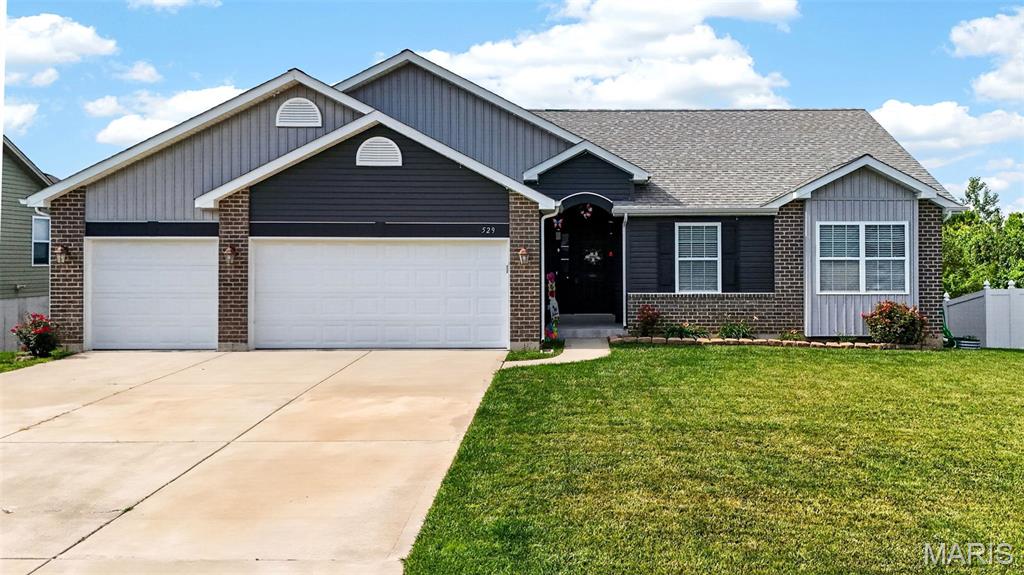 Welcome home to this beautifully maintained ranch built in 2018, offering 1,618 square feet of comfortable main-level living and room to grow with a full walk-out basement. Freshly painted throughout the main floor with professionally cleaned carpets, this move-in ready home is ready for its next owner. The open and inviting floor plan features 3 bedrooms and 2 full bathrooms, including a spacious primary owner's suite with dual vanities and a private bath. Step outside and enjoy a backyard designed for making memories. The white vinyl privacy fence creates a comfortable setting for outdoor living, while the above-ground swimming pool with attached composite deck provides the perfect place for summer fun, weekend barbecues, and gatherings with family and friends. Whether you're cooling off on a hot afternoon or entertaining guests, this outdoor space is ready to be enjoyed. The full walk-out basement offers endless possibilities for future living space, recreation, storage, or a workshop, while the oversized 3-car garage provides plenty of room for vehicles, tools, toys, and hobbies.