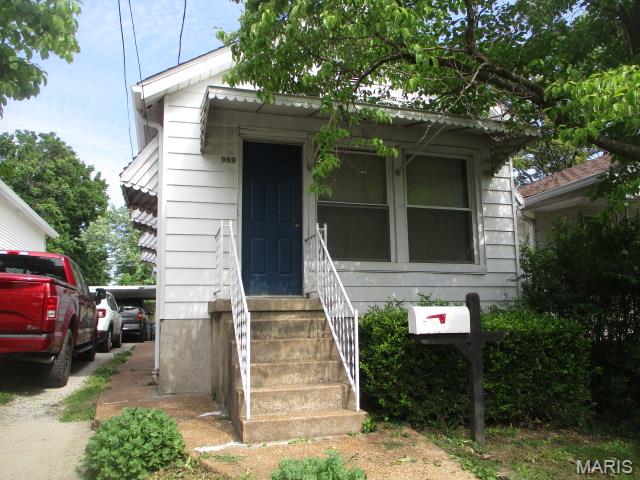 Just a fresh coat of paint will go a long way.  Enjoy evenings on the front porch or possibly convert the space into additional living area.  The home as a new(er) architectural style shingle roof.  Other highlights include: refinished kitchen cabinets, insulated windows, circuit breaker electric, copper lines and carport parking.
