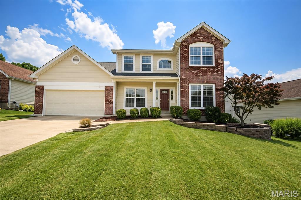 Welcome to 1126 Manor Cove Drive in the highly sought-after Westhampton Subdivision of St. Charles! This beautifully maintained 4-bedroom, 2 full bath, 2 half bath home offers the perfect blend of comfort, style, and functionality. Step inside a dramatic two-story entry foyer and soaring vaulted ceilings that create an open, airy atmosphere throughout the home.

The spacious open floor plan is ideal for both everyday living and entertaining, featuring a warm gas fireplace, separate dining room, and an inviting main living area filled with natural light. The kitchen flows seamlessly into the family room, making gatherings effortless and enjoyable. Convenient main floor laundry adds to the home's practical design.

Retreat to the spacious primary suite featuring a luxurious bathroom complete with a separate shower and soaking tub. The finished basement provides additional living and entertainment space, perfect for a recreation room, home office, or gym.

Additional highlights include a 2-car garage, generous bedroom sizes, and a beautifully designed layout that meets the needs of modern living. Located in the desirable Francis Howell School District and close to shopping, dining, parks, and major highways, this home is one you do not want to miss!

Schedule your private showing today and discover everything this exceptional Westhampton home has to offer!