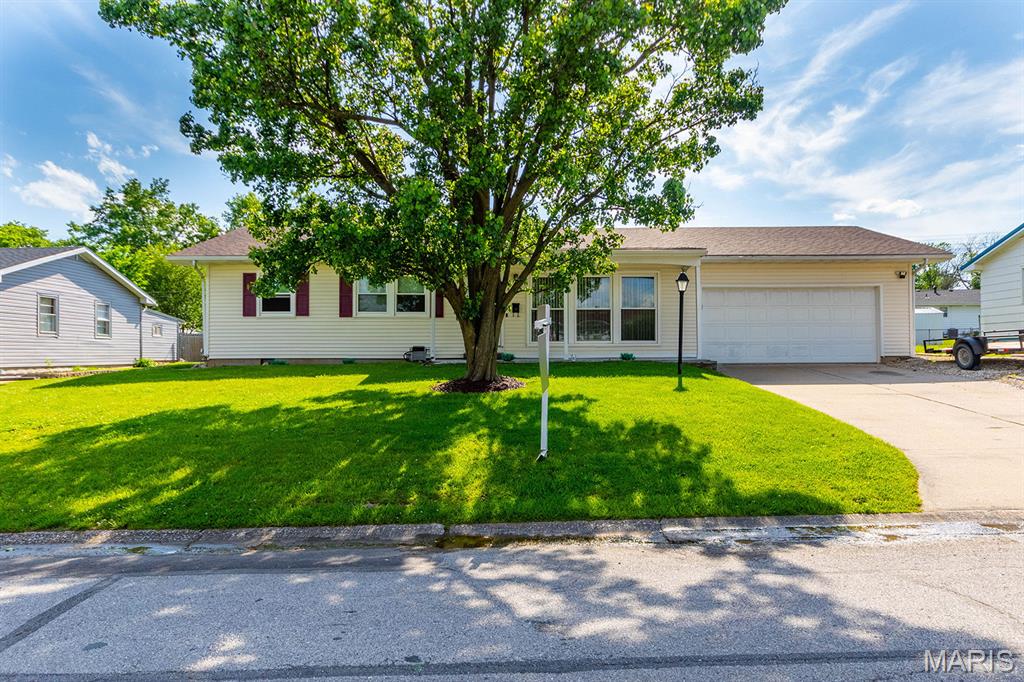 This move in ready home features three bedrooms and one and a half baths, highlighted by freshly remodeled bathrooms. You'll have peace of mind with new windows, a newer roof, newer HVAC system, and siding, making it as efficient as it is appealing.  Don't miss out on this wonderful home.