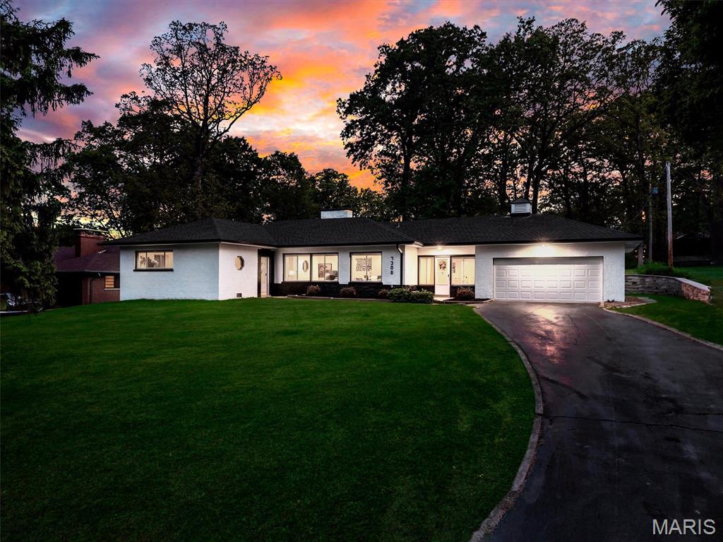 Welcome to 7308 Shiloh Ln in the coveted Grantwood Village neighborhood — a meticulously rehabbed, move-in ready ranch on nearly ½ acre in the Forest Haven subdivision. From top to bottom, inside and out, this home has been transformed w/ contemporary finishes & major mechanical updates throughout.
The main level impresses from the moment you walk in. Matching black granite countertops, white shaker soft-close cabinetry, black tile flooring & recessed lighting set the tone in the kitchen, which is fully equipped w/ SS appliances incl. gas cooktop, built-in gas oven, dishwasher & microwave. Refinished hardwood floors, crown molding, custom cabinetry & French doors add warmth & character throughout the living spaces. A wood-burning fireplace anchors the living room, w/ a separate dining room & pocket doors rounding out the main entertaining areas.
Main level offers 3 BD & 2 full BA, incl. a primary en-suite. Two add'l BDs share a full hallway BA. A convenient breezeway w/ main-level laundry hookup (W/D) connects directly to the attached 2-car garage w/ garage door opener & direct access. Double-pane windows, ceiling fans & ample natural light throughout.
The partially finished LL significantly expands the living space w/ an official 4th BD, 3rd full BA & spacious family room — fully built out & ready to enjoy. Remaining unfinished space offers room for storage, a home gym, workshop, or whatever suits your needs.
Major systems have all been addressed: 2 new HVAC systems (forced air/central air), new roof, fascia, soffit & gutters, brand-new water heater, & updated electrical. Concrete perimeter foundation w/ sump pump. Brick & stone exterior. Truly turn-key — zero deferred maintenance.
Outside, enjoy one of the largest lots on the street at nearly ½ acre. A rear patio is perfect for outdoor entertaining, w/ a huge backyard offering room to roam. Property is landscaped front & back w/ great curb appeal.
Located in the highly regarded Lindbergh School District — Sappington Elem. (7/10), Sperreng Middle & Lindbergh Sr. High (9/10). Low annual HOA of just $30. Easy access to major highways, dining & shopping. Don't miss your opportunity to own this stunning home in one of St. Louis's most sought-after communities!
