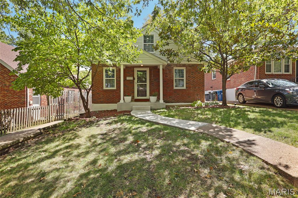 Welcome to 2140 Gray Avenue, a charming and updated 3 bedroom, 2 full-bath home offering exceptional space and versatility! Beautiful hardwood floors and an open living and dining area create a warm, inviting setting for everyday living and entertaining. The kitchen is a standout, featuring custom cabinetry, granite countertops, stainless steel appliances, abundant workspace, and a convenient breakfast bar. Easy access to the deck makes grilling and outdoor entertaining a breeze.

The home's open floor plan provides plenty of room to fit your lifestyle. The main floor flows easily from living to dining to kitchen and right outside to the back deck and patio overlooking the fully fenced yard.  2 bedrooms and a hallway full bath complete the main floor.  The 2 bedrooms have warm hardwood floors, natural light and ceiling fans.

The finished upper level offers wonderful bonus space for a large primary bedroom, home office, playroom, hobby area, or additional living space. Need even more room? The partially finished lower level adds valuable living space with recessed lighting, carpeting, and multiple areas ideal for a family room, recreation room, home gym, office, or play space. Convenient exterior access leads to the backyard.

Outside, enjoy a spacious deck, patio, and fenced backyard—providing multiple areas for relaxing and entertaining. Off-street parking adds everyday convenience. With 3 bedrooms, 2 full baths, an updated kitchen, beautiful hardwood floors, flexible finished spaces, and inviting outdoor living areas, 2140 Gray Avenue offers more room and possibilities than you might expect—all in a convenient St. Louis location!
