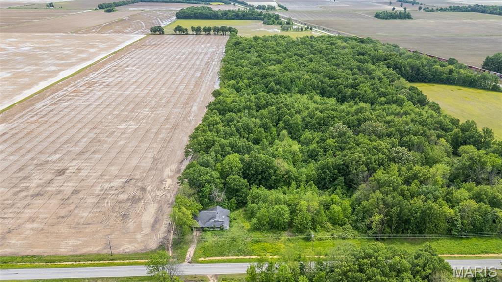 Discover the possibilities with this 15 acre +/- property located outside of Poplar Bluff city limits. All utilities are currently in place, making it an ideal canvas for your future plans. An old 1930s homesite is located on the property and is not currently livable, but offers potential for redevelopment or a fresh start with new construction. Whether you’re looking to build your dream home, create a private retreat, or invest in land with established utilities, this property provides a great foundation with endless opportunities!