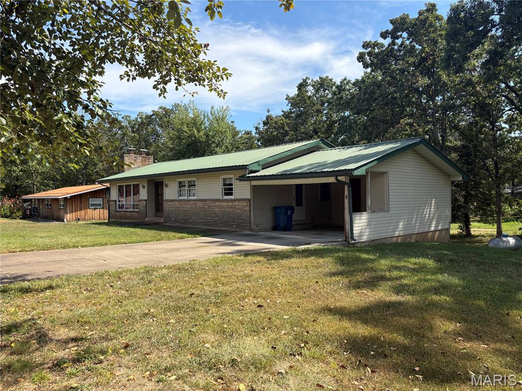 List at $139,995 - What a nice corner lot in the city of Viburnum. More to come on this property with details and interior photos. Viburnum is a community sitting in the middle of the Mark Twain National Forest with Dillard Mill State Park just 5 miles away. Council Bluff Lake with about 500 acres of great Pristine Ozark waters with great camping, manmade beach and great fishing. Less than an hour to Elephant Rocks and Johnson Shut Ins State Parks. Missouri is known for its great whitetail deer population, Wild Turkeys, even Elk about an hour south and Eagles have become common place in the Ozark Foothills.