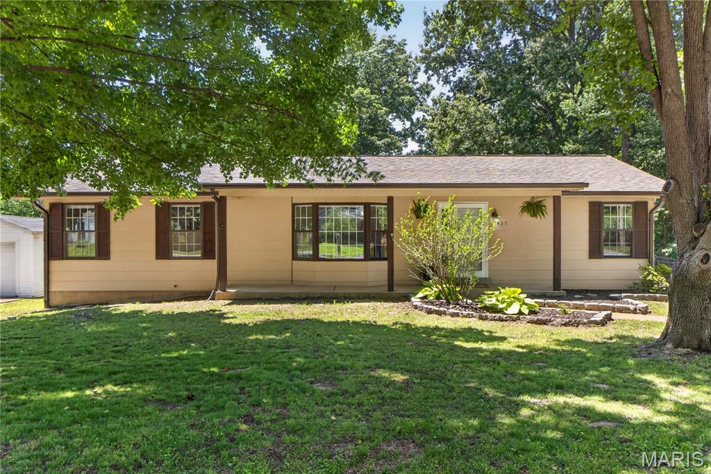 OPEN HOUSE CANCELED. Welcome home to this charming ranch in Maryland Heights! Enjoy peace of mind knowing the roof, gutters, and water heater are all less than two years old. This thoughtfully designed home offers 3 bedrooms and 3 full bathrooms, a convenient ranch floor plan, and an abundance of natural light throughout. The open kitchen features granite countertops, white cabinetry, and ample storage, creating a welcoming space for everyday living and entertaining. Large bay windows and French doors bring in plenty of natural light, while neutral finishes, newer flooring, and fresh paint provide a clean, move-in-ready feel. The finished lower level offers a spacious recreation room, full bathroom, and excellent storage, providing plenty of room to relax or entertain. The large primary bathroom features a Jacuzzi tub, perfect for unwinding at the end of the day. A convenient central vacuum system adds to the home's functionality. Step outside to your private backyard retreat featuring mature trees, natural shade, a large deck, and full fencing. The oversized yard offers plenty of space for outdoor entertaining, gardening, or simply enjoying the peaceful setting. Additional highlights include a rear-entry two-car garage and RV/camper parking with a 30V electrical hookup. Located in a quiet, friendly neighborhood with easy access to major highways and the airport, as well as nearby parks, trails, dining, and entertainment. This Maryland Heights ranch offers a great combination of updates, comfortable living spaces, outdoor enjoyment, and hard-to-find extras!