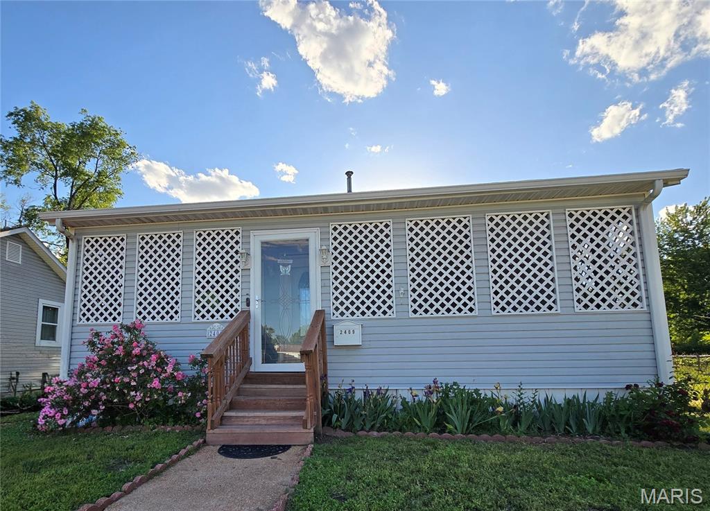 Charming and beautifully remodeled and completely move in ready.  This stunning 3-bedroom, 1 bath, bungalow sits on a spacious 50 x 125 lot and offers the perfect blend of modern updates and timeless character. From the moment you arrive you'll appreciate the inviting curb appeal and welcoming atmosphere this home provides.  Inside you'll find gorgeous hardwood flooring complemented by brand-new carpeting, fresh paint, wainscotting, making this home ready for immediate occupancy.  The bright and comfortable floorplan creates a warm, inviting environment perfect for everyday living or entertaining guests.  Every detail has been thoughtfully refreshed to provide a clean, stylish, and low maintenance living experience.