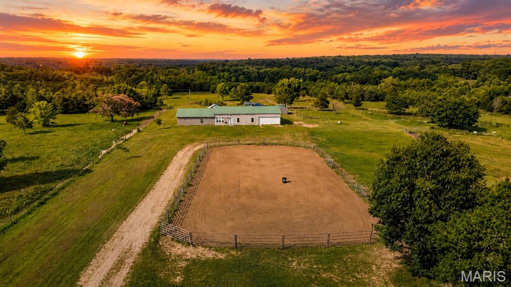 Escape to your own private Ozark Farmstead! Nestled on 20 picturesque acres just minutes from Salem, this rustic Barndominium style property offers the perfect combination of peaceful country, living and everyday convenience. Hidden just off the highway for easy year-round access, this 3- bedroom,2-bath home with an attached garage is connected to a spacious 24 x 60 barn, creating the ideal set up for horse lovers, hobby farmers, or anyone looking for room two live, work, and play.
This property is thoughtfully designed for livestock with three fenced pastures, a paddock, riding Arena, animal pens, and multiple storage sheds, making it move in ready for horses, cattle, goats or other farm animals. Enjoy beautiful open pastures, mature trees, and the privacy you’ve been searching for while still being just minutes from town.
Outdoor recreation is right at your doorstep. Located just 10 minutes from Salem, a short drive to Montauk State Park, and surrounded by Mark Twain national Forest, you will have endless opportunities for horseback riding, hiking, hunting, fishing, floating, ATV riding, and exploring the scenic Ozarks. With miles of nearby trails in public land this property is perfect situated for those who love the outdoors.
Whether you’re looking for a working horse farm, a recreational retreat, or your forever home this one-of-a-kind property offers a lifestyle you’ve been dreaming of. Call the listing agent today.
