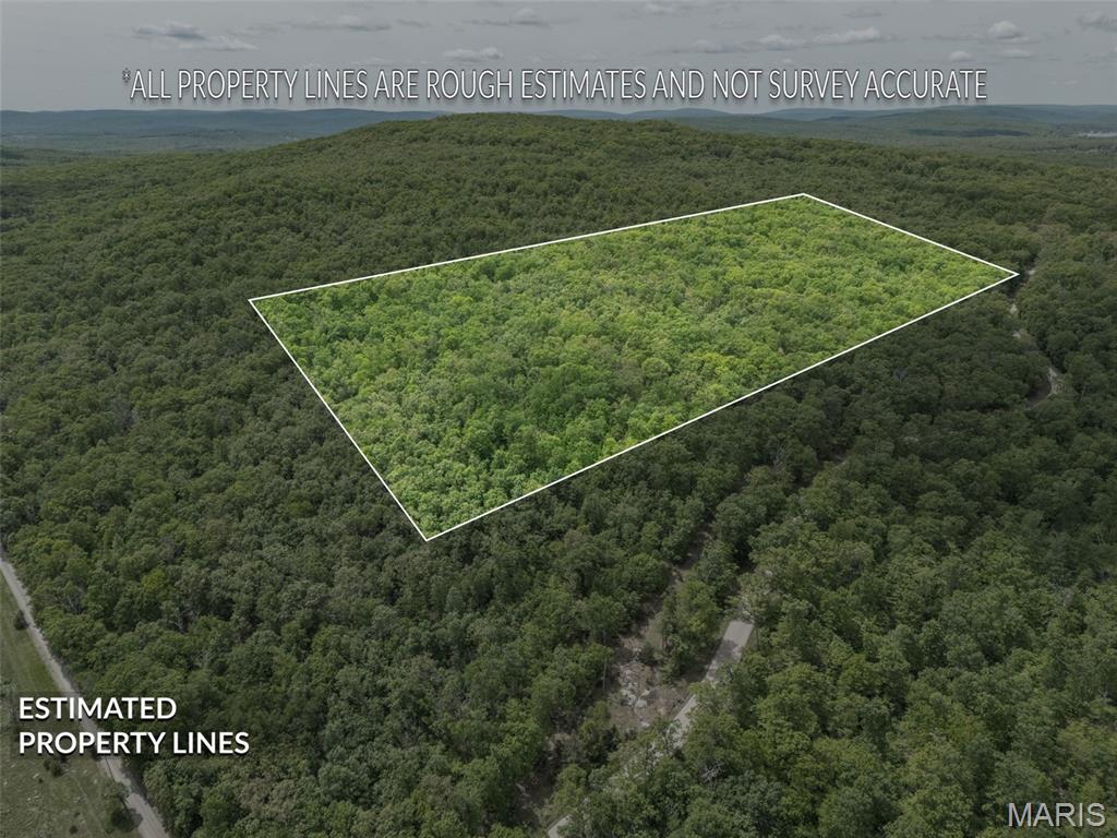 Untouched, wooded acreage offering privacy, versatility, and long-term potential. This 24.35-acre tract (northern portion) sits in a quiet rural setting just outside Doe Run and is ideal for a variety of uses including residential, recreational, hunting, or future development.

The property features natural terrain, mature timber, and a secluded feel while still maintaining access to utilities nearby. Whether you're looking to build, invest, or simply own a piece of land to enjoy, this tract provides a blank slate to bring your vision to life.

This property was recently divided from a larger 48.7-acre parcel, and the assessor’s records and maps may not yet reflect the updated split. The tract being offered is the northern portion (Tract A). Survey is available and should be used for reference.

No restrictions and no HOA.

Property does not have an assigned address. Located on Buck Mountain Rd near 827 Buck Mountain Rd. See map for approximate boundaries.